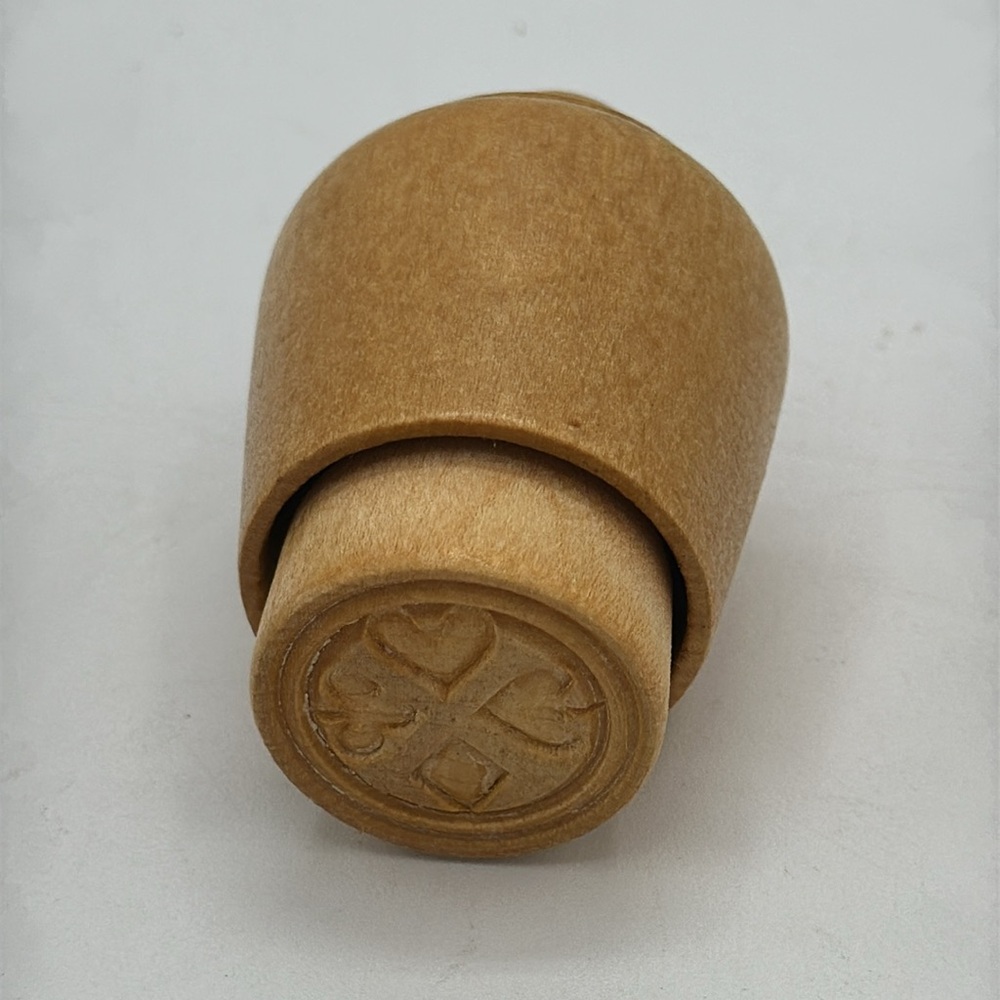 Antique butter press mold with card suit symbols